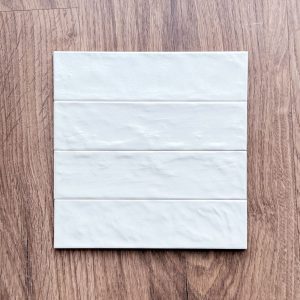 white metro tiles bathroom feature wall
